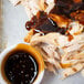 A plate of food with Sweet Baby Ray's Sweet Teriyaki Wing Sauce and Glaze.