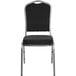 A Flash Furniture black fabric banquet chair with a black and silver frame.