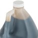 A La Choy 1 gallon plastic jug of soy sauce with a white cap.