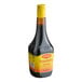 A 27 oz. bottle of Maggi liquid seasoning with a yellow cap and label.