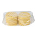 A stack of Kellogg's Eggo Homestyle Waffles wrapped in plastic.
