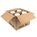 A white cardboard box with four Pilsudski Polish Style Horseradish Mustard jars inside.