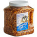 A case of 3 plastic containers of J. Hungerford Smith Maple Walnut Dessert Topping on a table.
