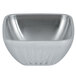 A silver Vollrath fluted metal bowl with a white background.