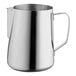 A polished stainless steel frothing pitcher with a handle.