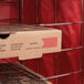 a pizza box on a shelf