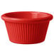 A red fluted melamine ramekin.