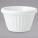 A white fluted melamine ramekin.