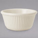 An ivory fluted melamine ramekin.