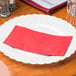 a close up of a red cloth