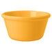 A close up of a tropical yellow smooth melamine ramekin.