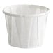 A small white paper souffle or portion cup with a 0.5 oz. capacity.