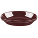 A white oval bowl with a dark brown rim.