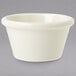 A white GET smooth melamine ramekin on a gray surface.