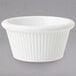 A white fluted melamine ramekin.