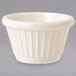An ivory fluted melamine ramekin.