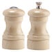 A Chef Specialties wooden pepper mill with a silver cap on a white background.