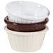 A stack of white fluted melamine ramekins.