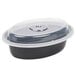 A black plastic Pactiv Newspring VERSAtainer oval container with a clear lid.