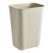 A beige Rubbermaid rectangular fire-resistant medical wastebasket.