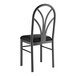 A Lancaster Table & Seating Spoke Back chair with a black fabric seat on a metal frame.