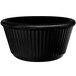A black fluted melamine ramekin with a black rim.