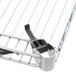 A Metro Super Erecta chrome wire shelf with a black clip.