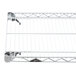 A Metro Super Erecta wire shelf with a handle.