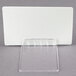 A white plastic card with a clear plastic holder.