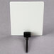 A white square with a black clip on top.