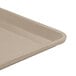 A close-up of a taupe Cambro dietary tray.