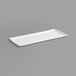A white rectangular Channel plastic platter with ribbed lines.