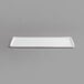 A white rectangular Channel plastic platter with ribbed texture.