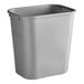 A Rubbermaid grey rectangular plastic trash can.