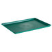 A green rectangular plastic platter with a spiral pattern.