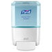 A white Purell Healthy Soap dispenser.