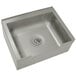 A stainless steel Advance Tabco mop sink with a drain.