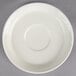 A cream white Oneida Odyssey saucer with a small rim.