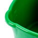 a close up of a green bucket