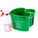 A green San Jamar Kleen-Pail bucket with a white spray bottle.