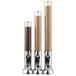 A group of acrylic dry food dispensers with different grains in them.