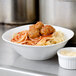 A bowl of Napoli spaghetti and meatballs.