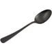 A black spoon with a long handle.