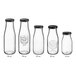 A row of clear glass Acopa milk bottles with black lids.