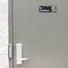 A door with a Thunder Group No Admittance sign on it.