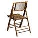 A Flash Furniture American Champion bamboo folding chair with a wooden seat and backrest.