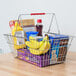 A Regency shopping basket filled with food including a bunch of bananas.