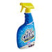 A blue and yellow OxiClean spray bottle.