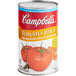 A 46 fl. oz. can of Campbell's Tomato Juice with a white label.