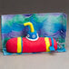 A red submarine made of yellow and blue Crayola Model Magic.